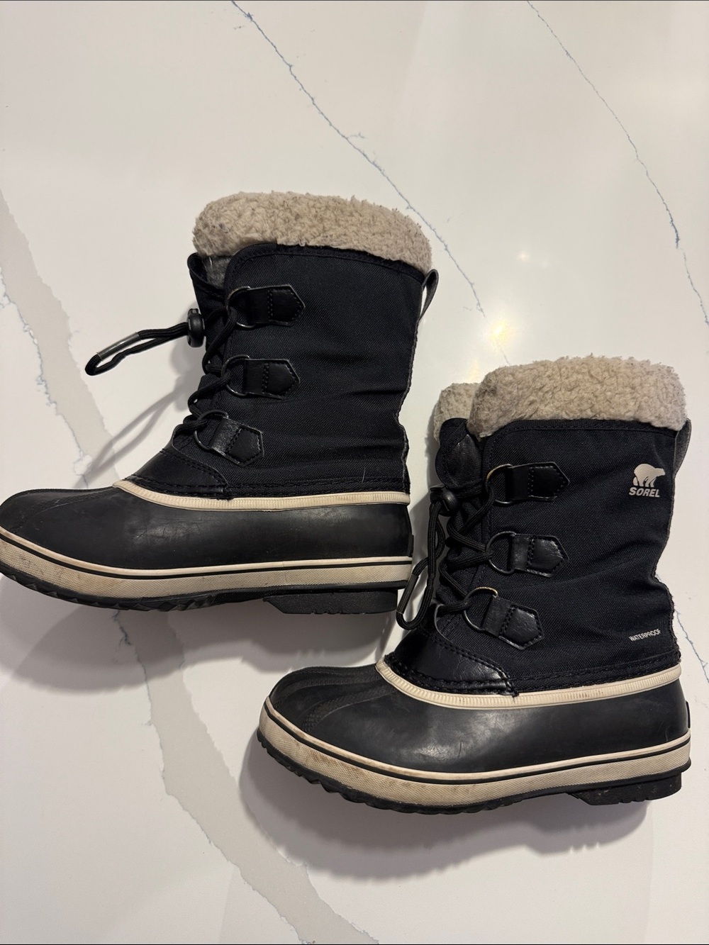 Sorel Kid’s Black Boots with Cream Sherpa Collar